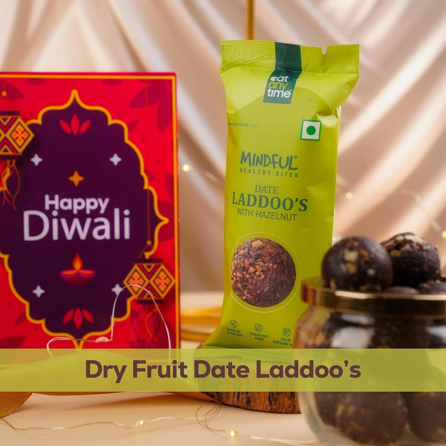 81zjixqn28l. sl1500 Eat Anytime Diwali Dhamaka Hamper | 11 Items Diwali Gift Box with Dry Fruits, Chocolates, Date Laddoos, Roasted Namkeen, Beautiful Diyas, Rangoli, Lights & more | Perfect Family & Corporate Gifting